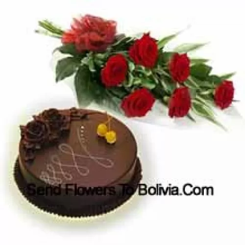 A Beautiful Hand Bunch Of 7 Red Roses Along With 1 Lb. (1/2 Kg) Chocolate Cake