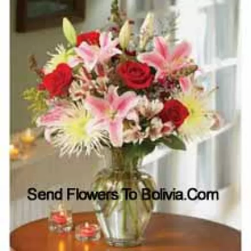Pink Lilies And Red Roses In A Glass Vase